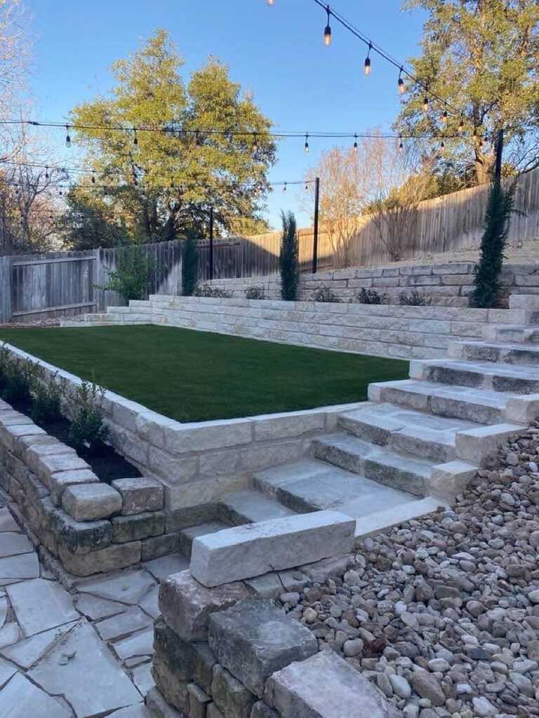 Flagstone patio installation - LongHorn Landscape hardscape